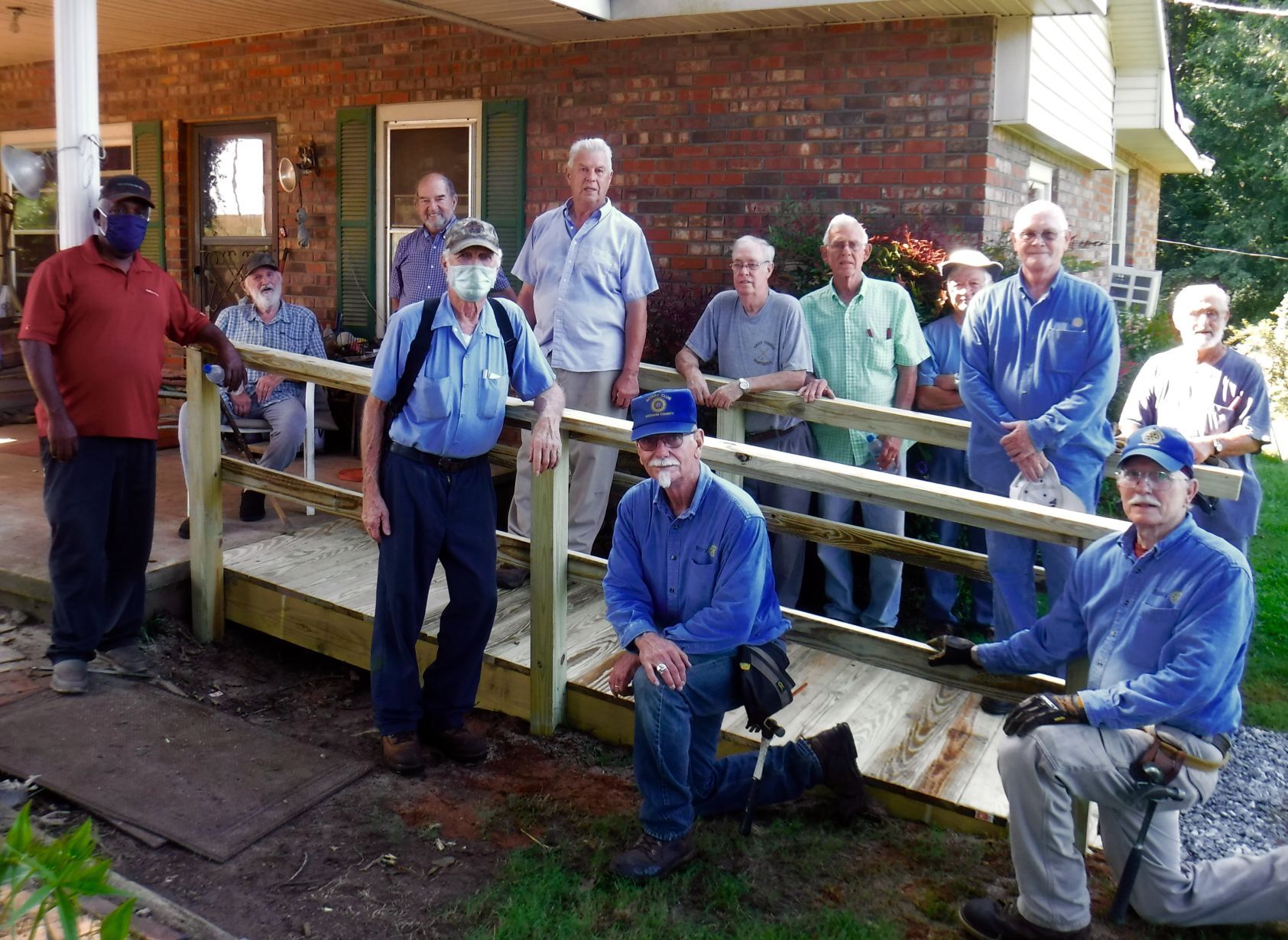 Rotary Club assists Walter Brown with a ramp